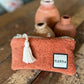 La pochette BABY Terracotta-Orange brûlée
